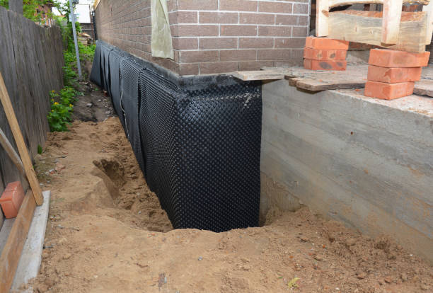 Happy homeowners after waterproofing job in Hazel Park